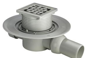 Features of the design of a shower drain in a floor under tiles